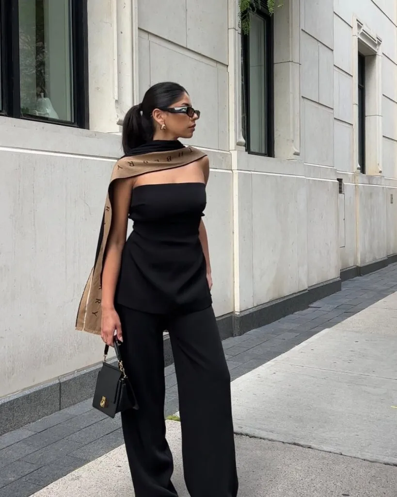 Black strapless top wide leg trousers and beige scarf outfit