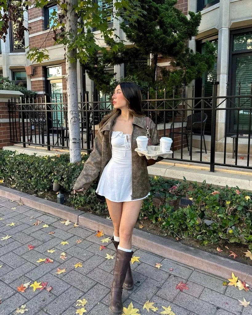 White mini dress brown jacket and knee high boots autumn outfit