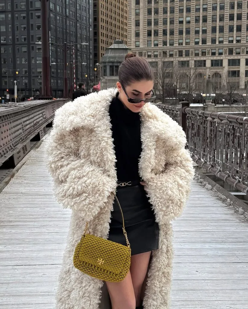 Faux fur coat black turtleneck and leather mini skirt winter outfit