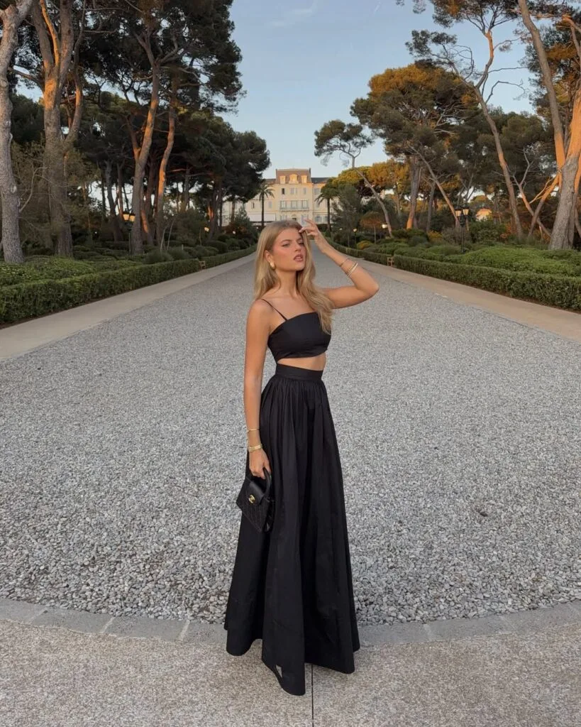 Black crop top with flowing maxi skirt
