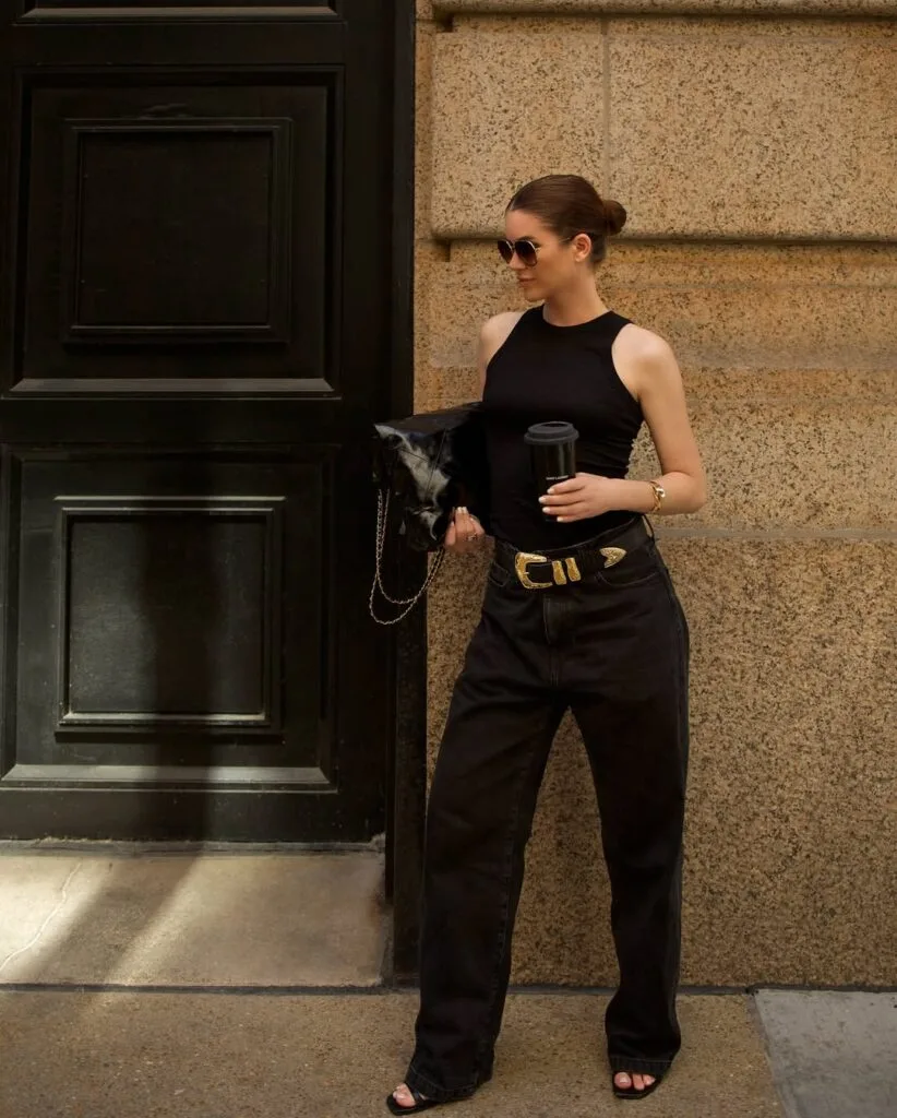 Black tank top with relaxed trousers