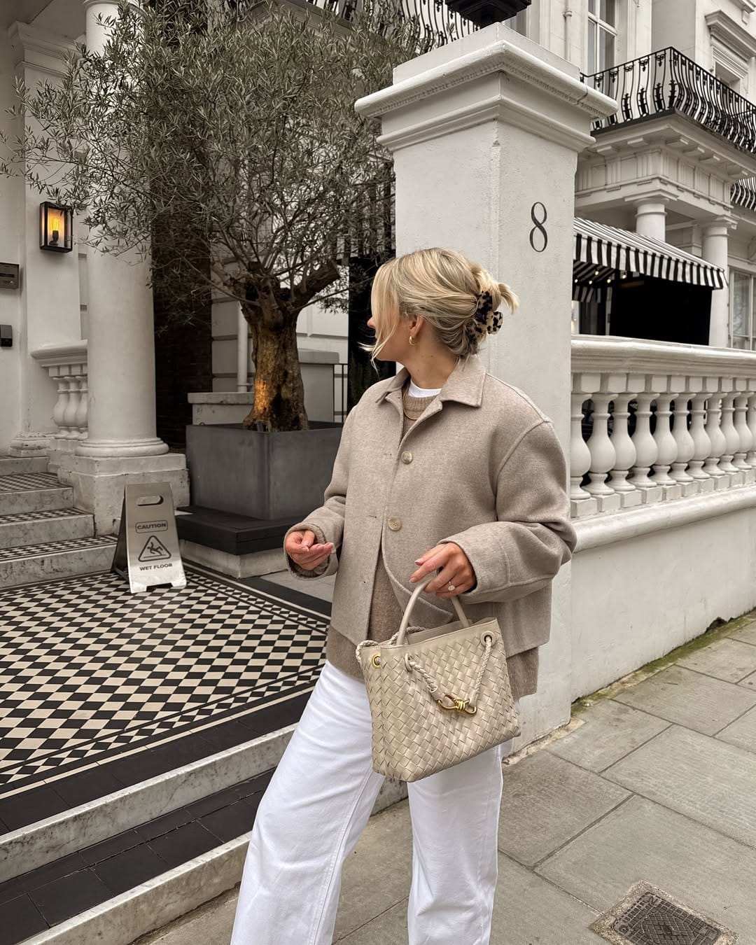 NYC Spring Outfits Beige Wool Jacket with Layered Knit & White Trousers