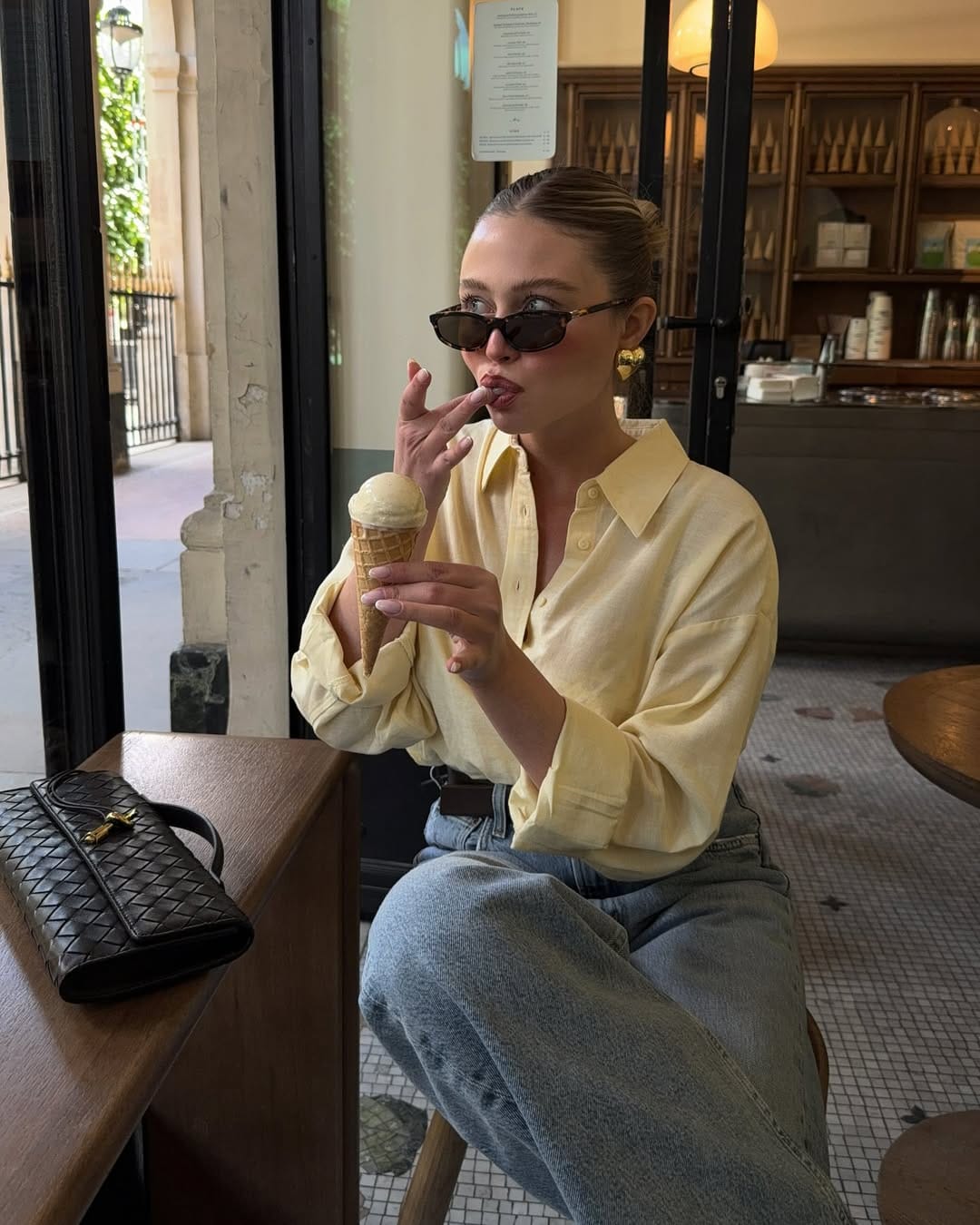 Butter yellow oversized linen shirt with straight-leg jeans relaxed summer outfit