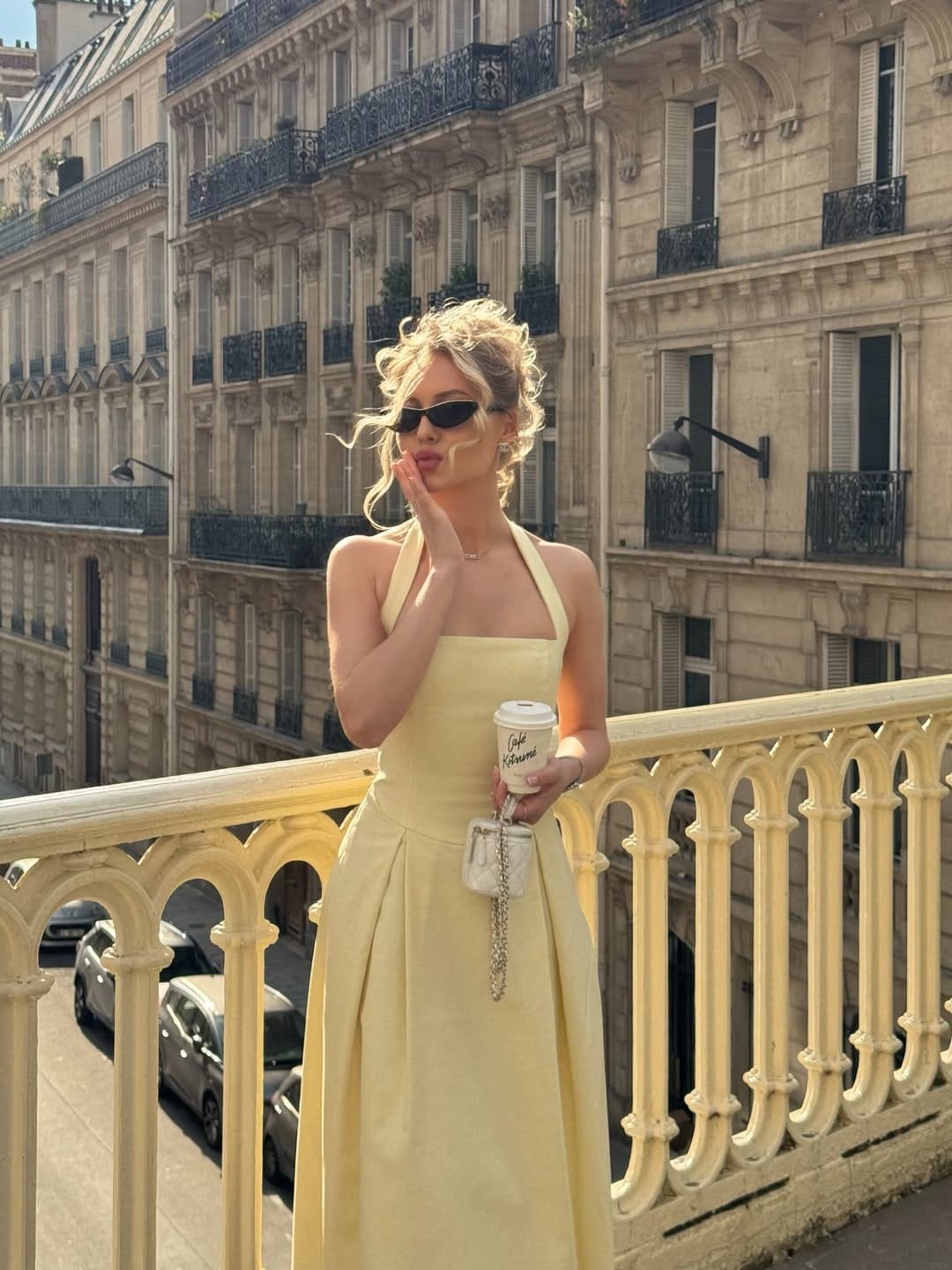 Butter yellow halter neck structured midi dress with mini chain bag