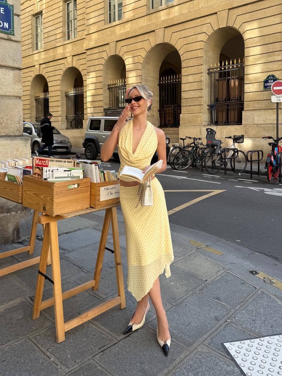 Butter yellow polka dot halter co-ord with two-tone heels playful look