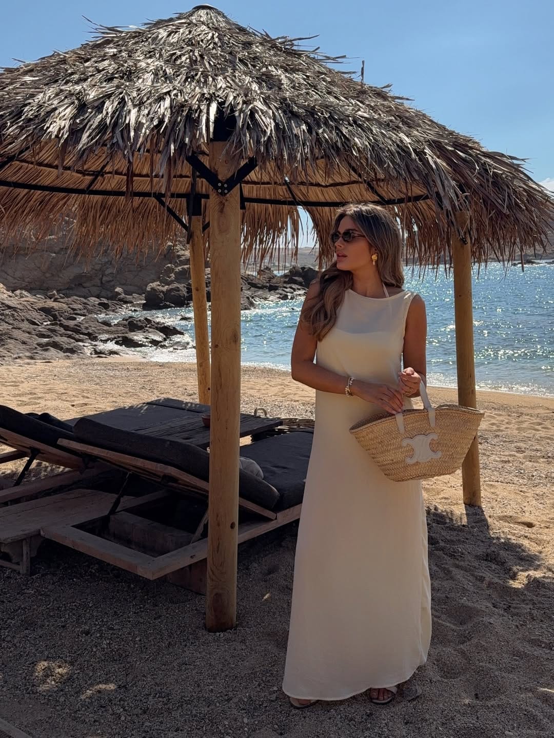 Butter yellow sleeveless column maxi dress with Celine basket bag minimal outfit