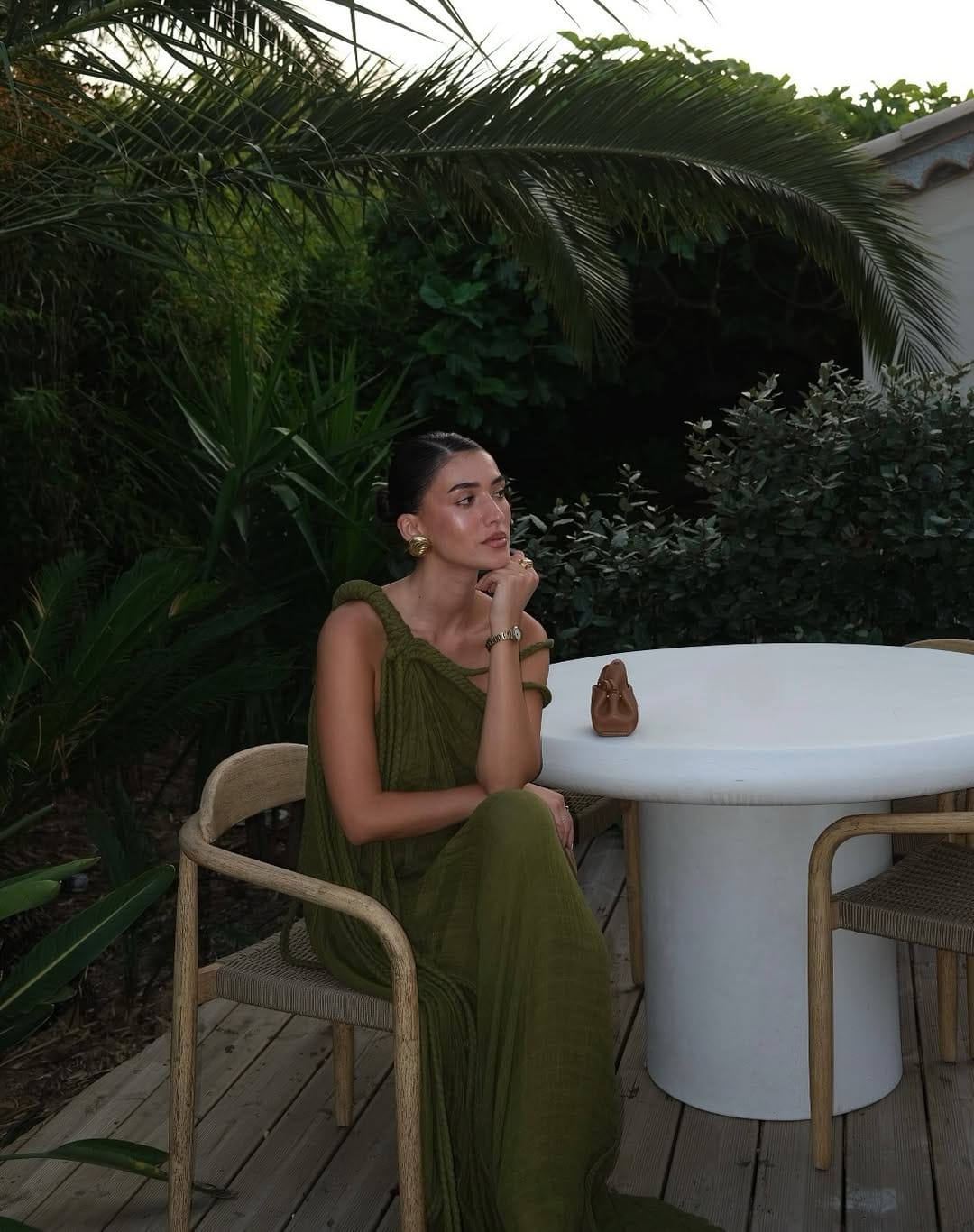 Olive green ribbed crochet maxi dress with a sleek fitted design