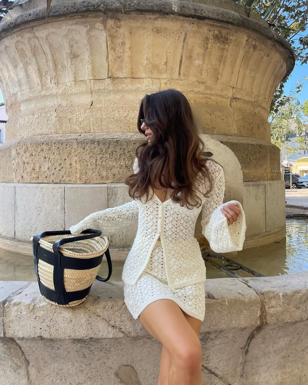 Ivory crochet cardigan paired with a matching mini skirt co-ord