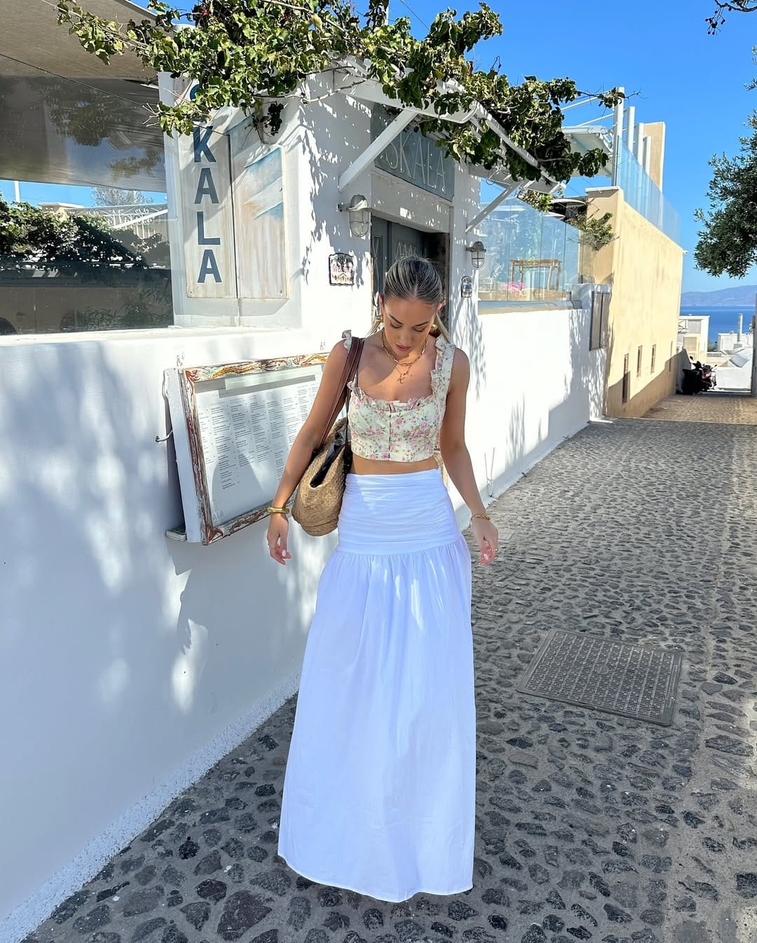  Floral corset crop top with white ruched maxi skirt in Santorini Greece alleyway