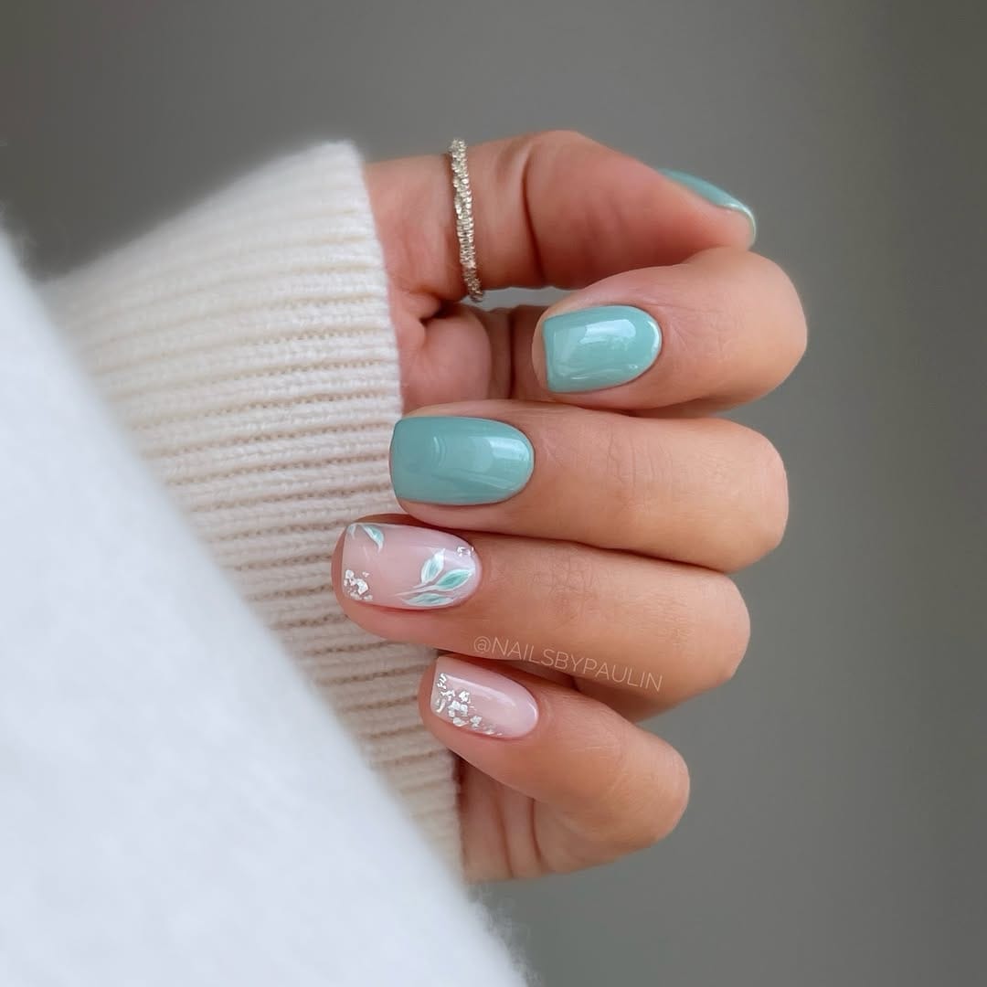 Sage teal short square nails with a sheer botanical accent nail