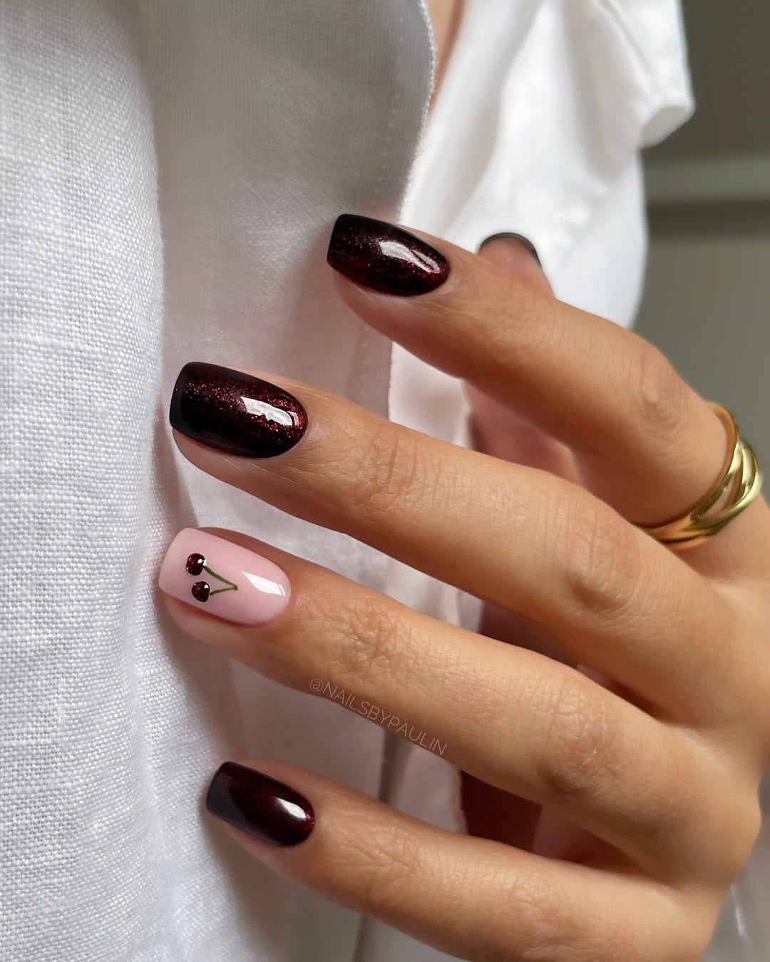 Deep black cherry glitter square nails with pink cherry accent