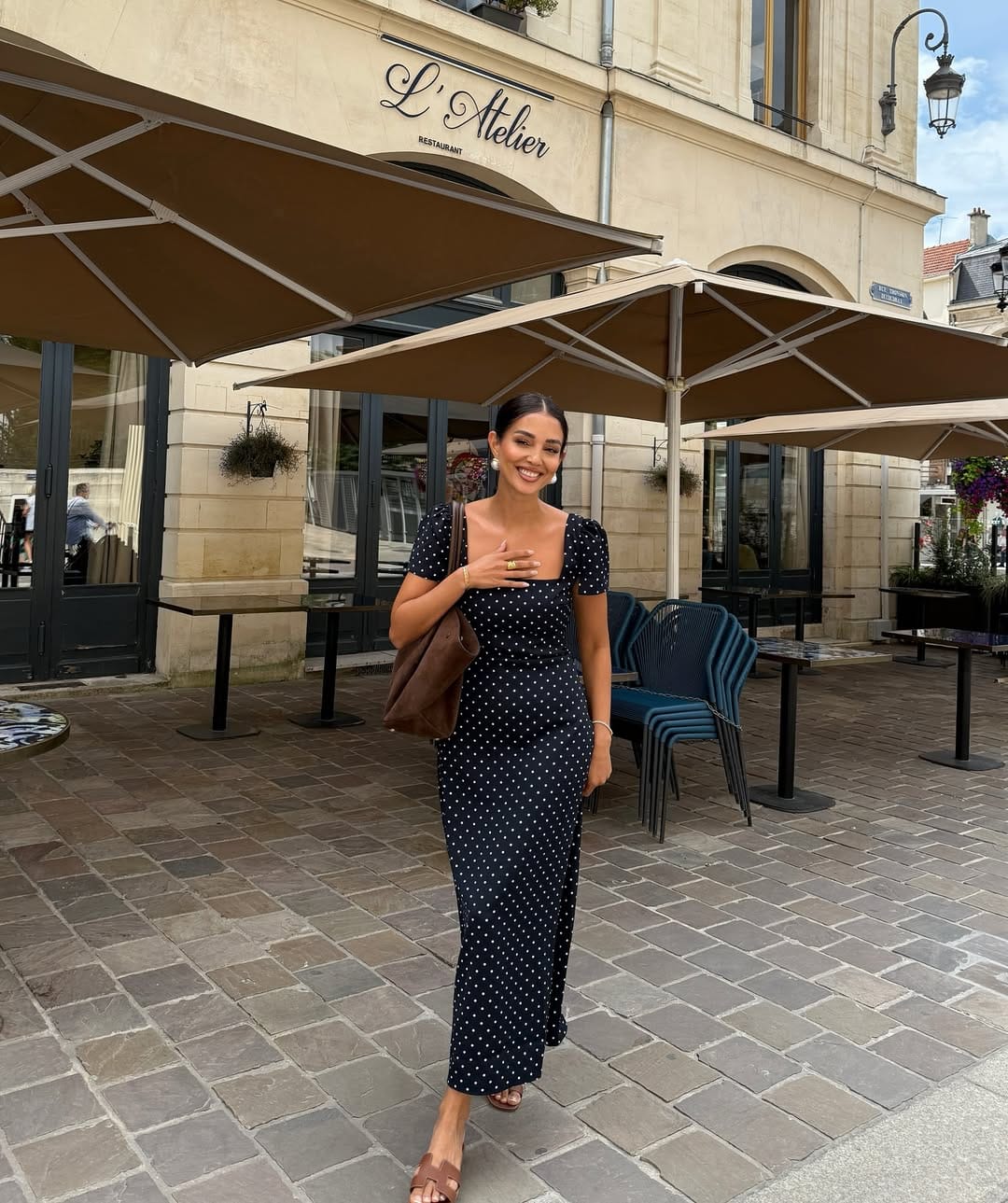 Black and white polka dot square-neck midi dress with a timeless Parisian vibe