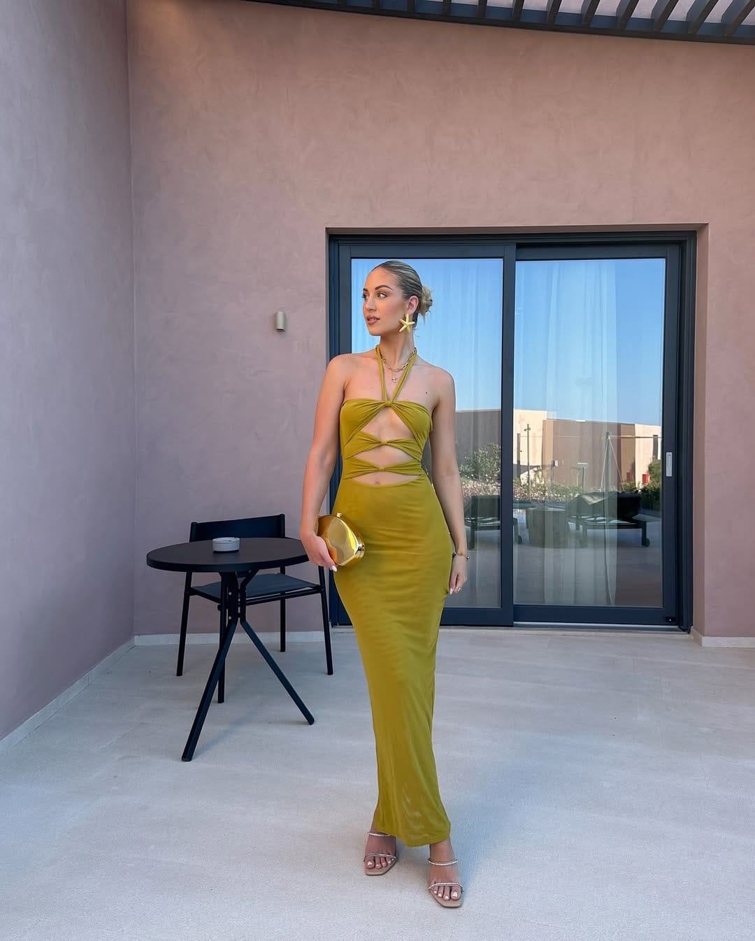 Chartreuse cutout halterneck maxi dress for a bold summer date look