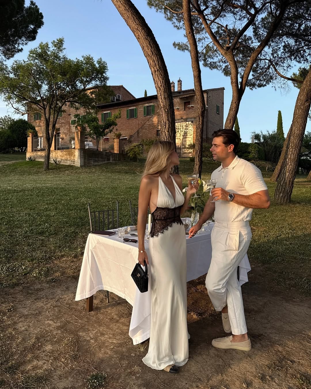 White Satin Halterneck Gown With Black Lace Waist Insert