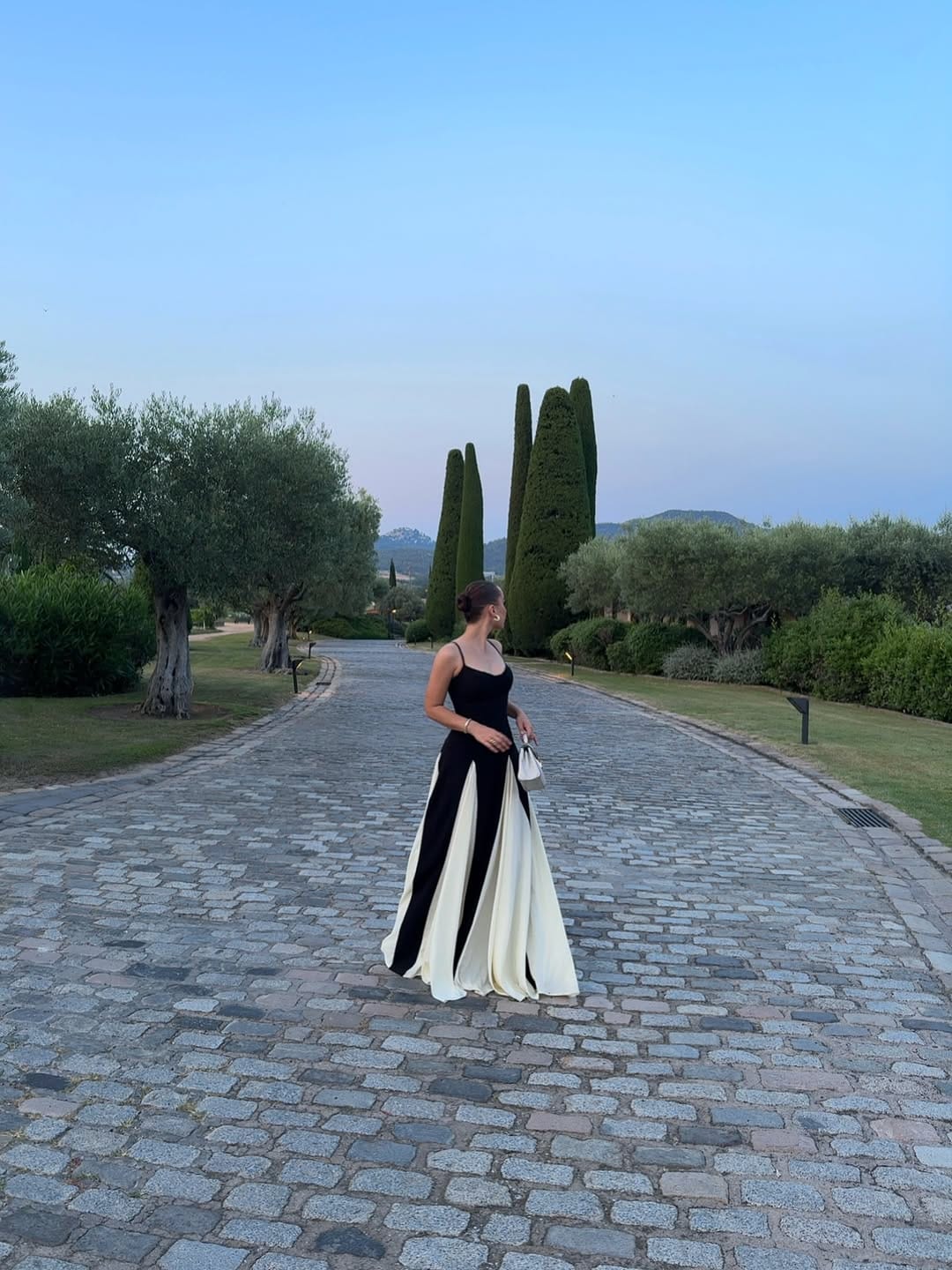 Black and ivory colourblock ballgown skirt paired with a spaghetti strap top