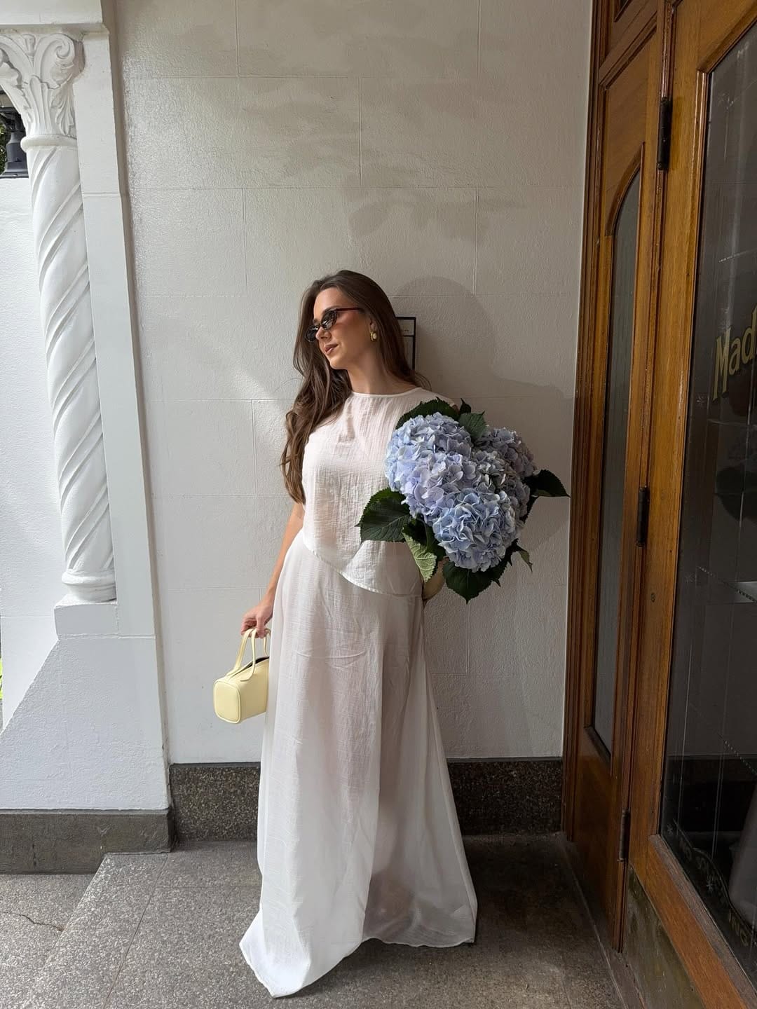 White textured linen maxi dress styled with a lemon box bag