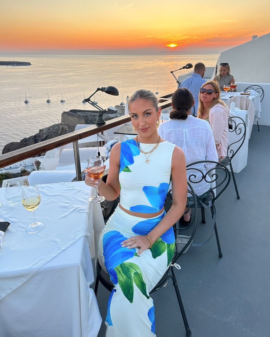 White and blue oversized floral crop top paired with a matching maxi skirt