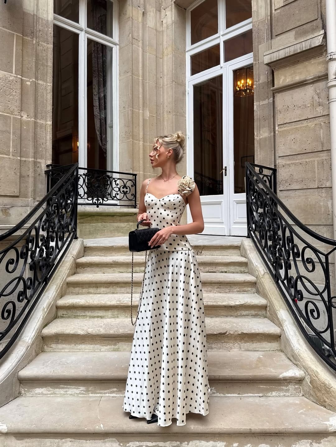 White polka dot corset bodice paired with a flowing maxi skirt set