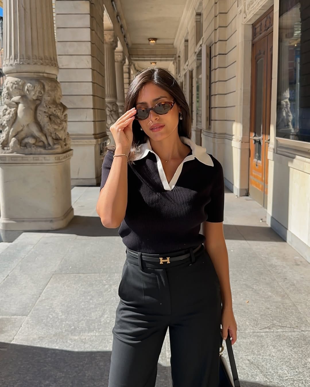 Black polo knit with tailored trousers timeless work outfit