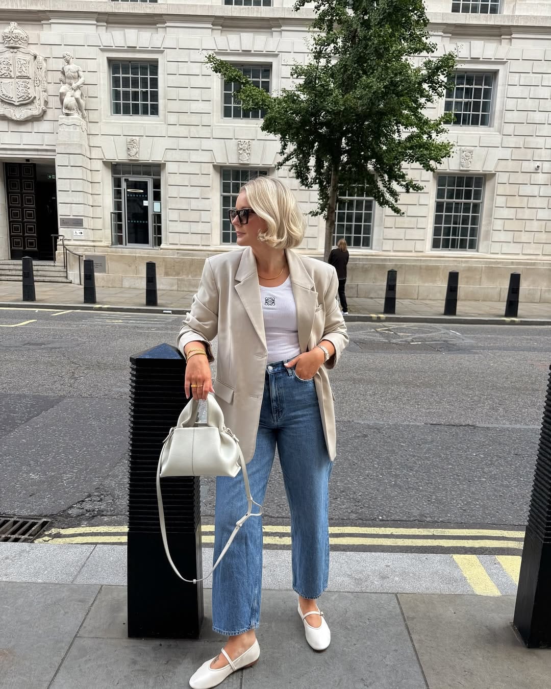 Sand blazer with white ribbed tank and wide-leg jeans casual office outfit