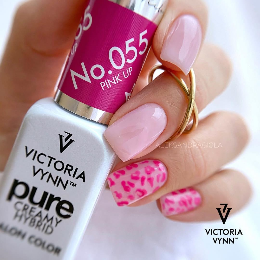 Soft pink nails with leopard print accent for a simple summer nail idea