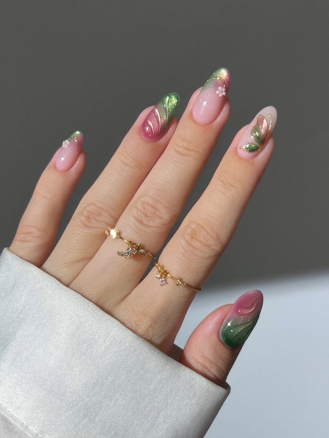 Green and pink botanical swirl nails for a simple summer nail idea