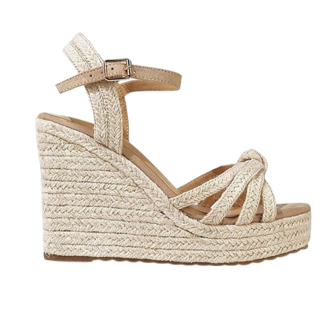 Chic espadrille wedges styled with a breezy summer dress inspired by the best summer shoes 2026 aesthetic.