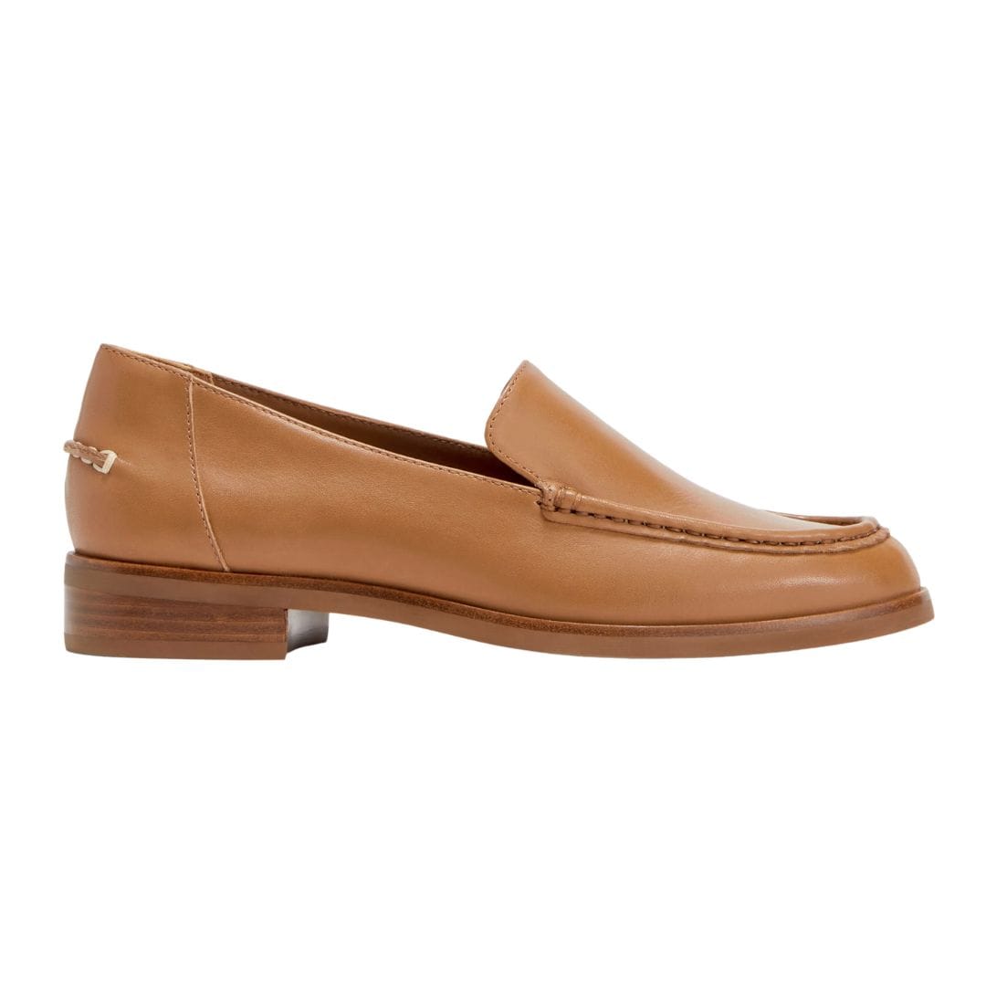 Trendy loafers paired with a polished summer outfit for an effortless and stylish 2026 fashion look.