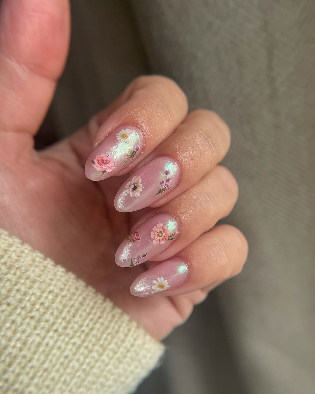 Pressed flower iridescent gel nails for a botanical nail trend 2026