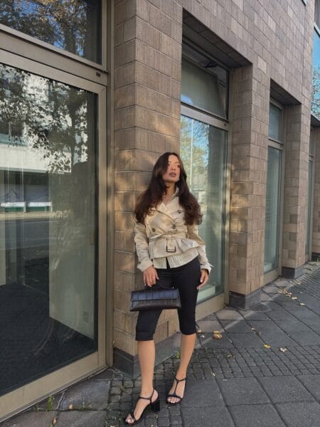 Cropped trench jacket with black capri pants and T-bar heels outfit