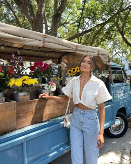 White cropped short-sleeve shirt with pearl-embellished wide-leg jeans July outfit