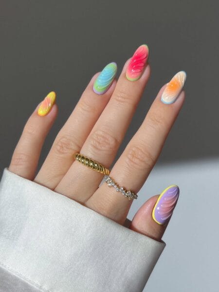 Rainbow Swirl Aura Nails — long almond nails with multicolour swirl aura art in coral, aqua, yellow, orange and purple on each nail