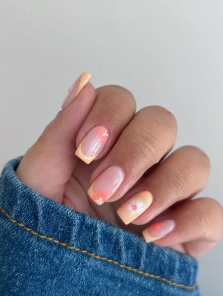 Peach French tip short square nails with coral cherry blossom detail july nail design