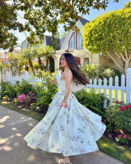 Pale floral full-skirt midi dress with white sandals feminine modest summer outfit
