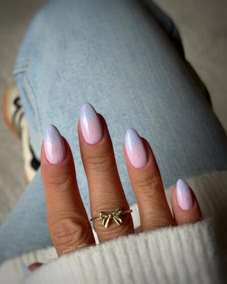 Baby pink and blue pastel polka dot nails with periwinkle raised dots on soft pink almond base