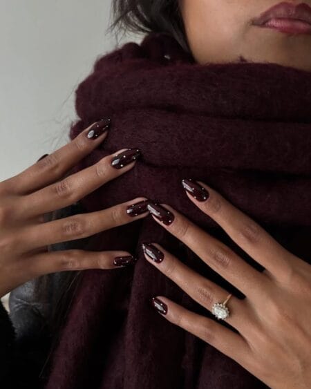 Glossy espresso brown almond nails with a rich coffee-inspired finish.