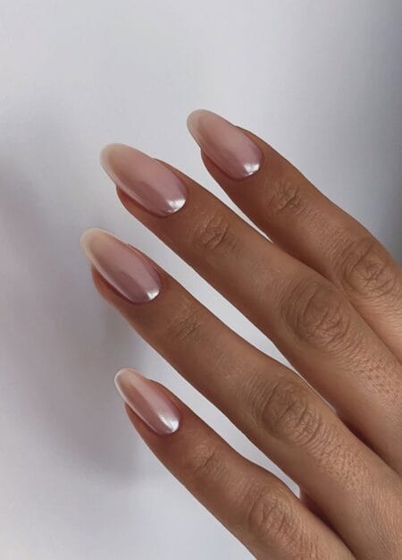 Bronze chrome nails with a reflective metallic autumn finish.
