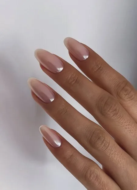 Bronze chrome nails with a reflective metallic autumn finish.
