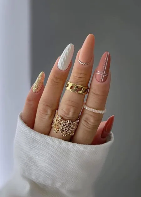 Cream cable knit sweater texture nails with a matte finish.