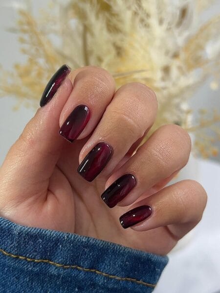 Dark cherry cat eye maroon nails on short square shape