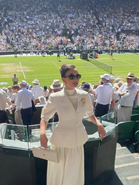 Ivory peplum jacket with wide-leg trousers for a polished Wimbledon look.