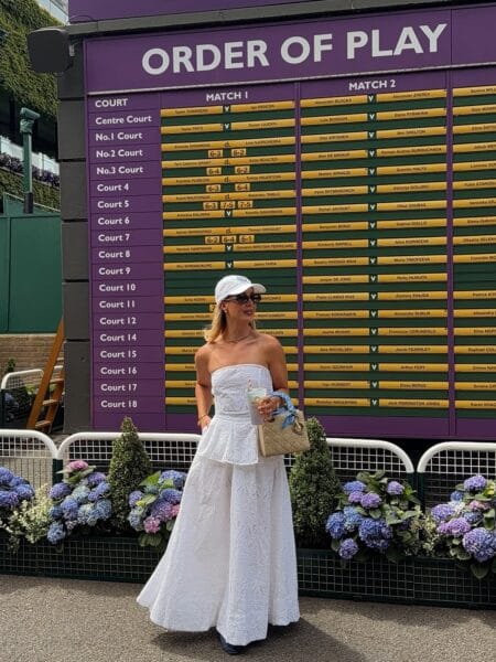 Broderie anglaise halter top with wide-leg trousers for a chic Wimbledon outfit.