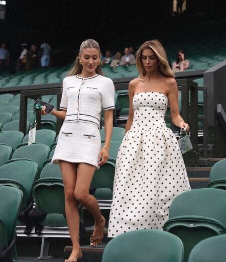 White tweed two-piece outfit paired with a white polka dot gown for Wimbledon.