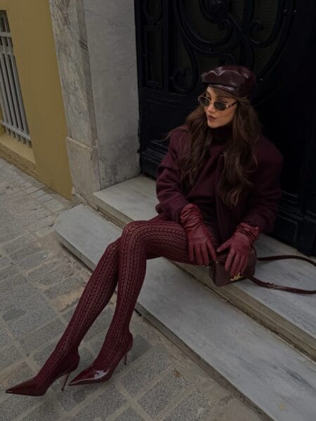 Head-to-toe burgundy outfit with beret, coat and pointelle tights for fall