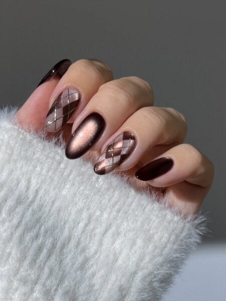 Chocolate cat-eye and gold argyle almond fall nails
