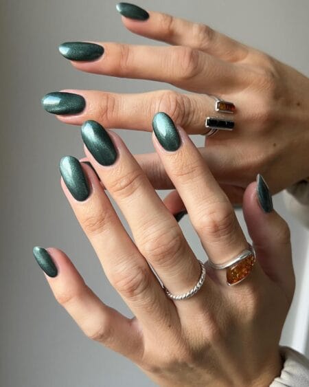 Emerald green cat-eye almond nails for fall
