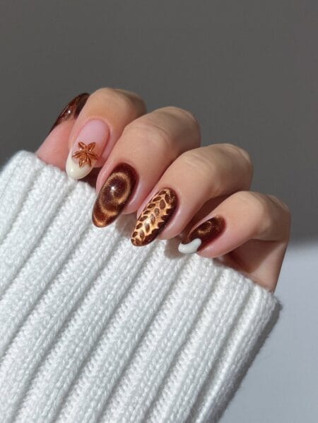 Copper cat-eye fall nails with bronze leaf accent
