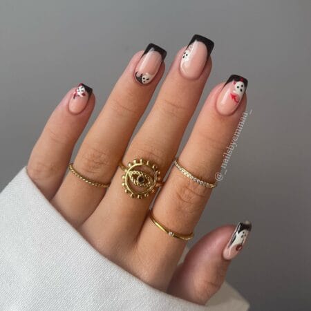 Short square nails with black French tips and peeking ghosts