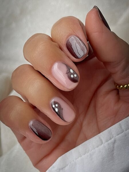Smoky mauve cat eye nails with white bead accents