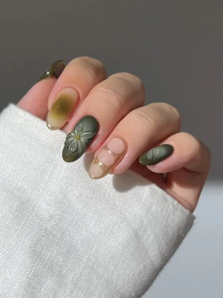Olive green glossy nails with an earthy autumn-inspired finish.
